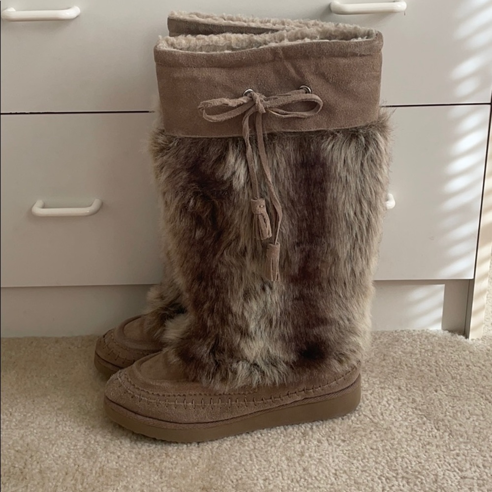 Knee high fur boots
